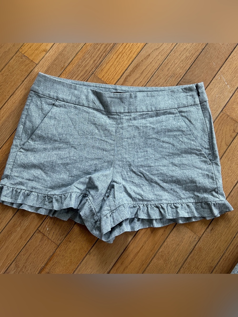Loft LNC flat front ruffled hem chino shorts